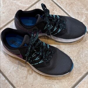 Nike Women’s Black Running Shoes with Teal and Purple Accents